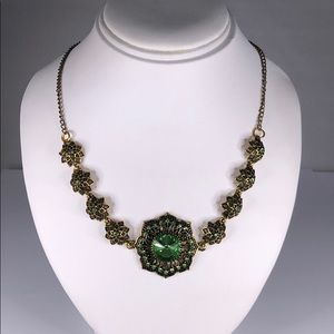 Antique Style Gold tone necklace with green stones